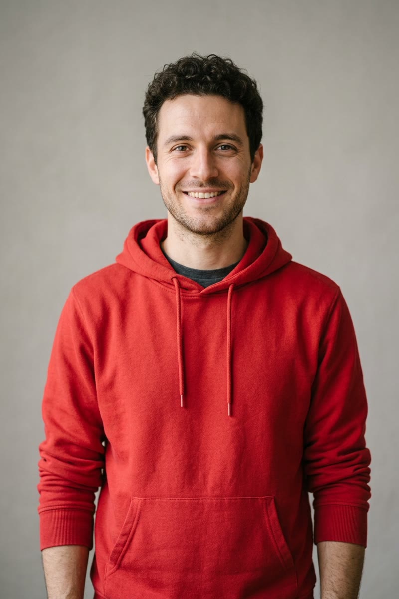 Photo 1: fictional man in a red hoodie
